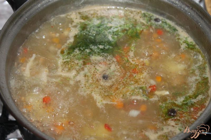 Фото приготовление рецепта: Гречневый суп на мясном бульоне с утиным и куриным мясом шаг №8
