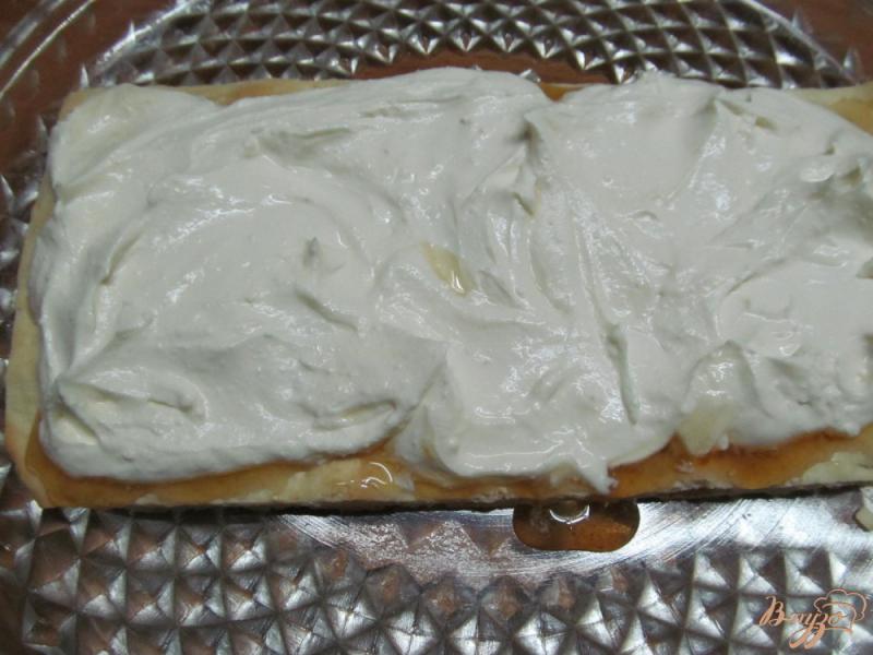 Фото приготовление рецепта: Слоеный пирог с творожной начинкой шаг №12