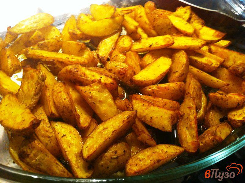 Фото приготовление рецепта: Картофельные дольки из духовки шаг №5