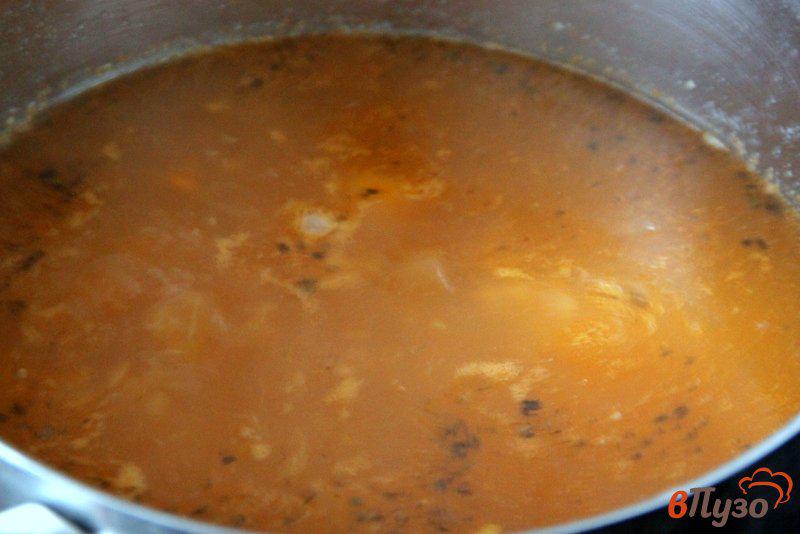 Фото приготовление рецепта: Куриный суп с помидорами шаг №7