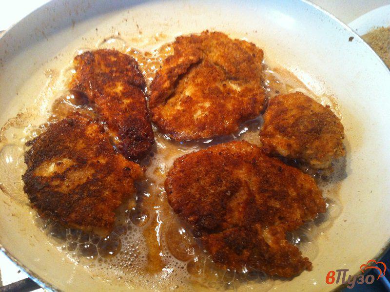 Фото приготовление рецепта: Куриные отбивные в пикантном соусе шаг №10
