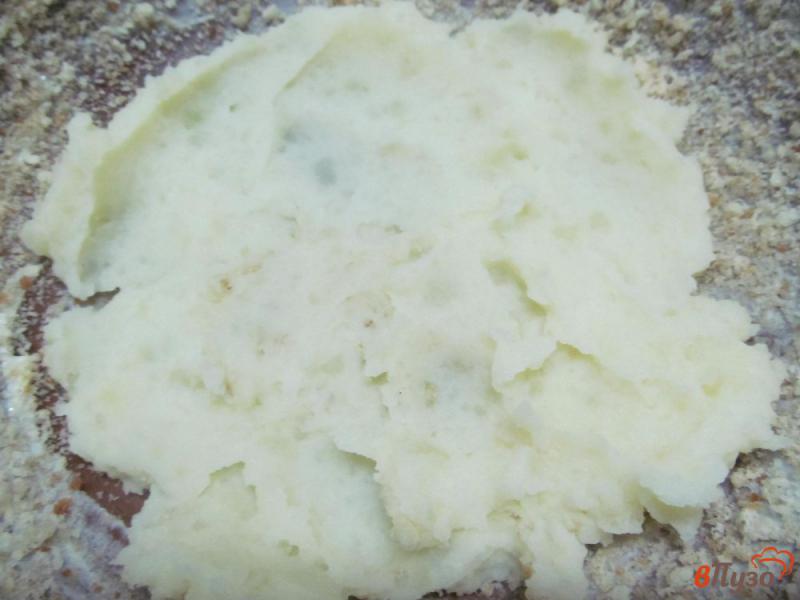 Фото приготовление рецепта: Запеканка картофельная с фрикадельками шаг №6
