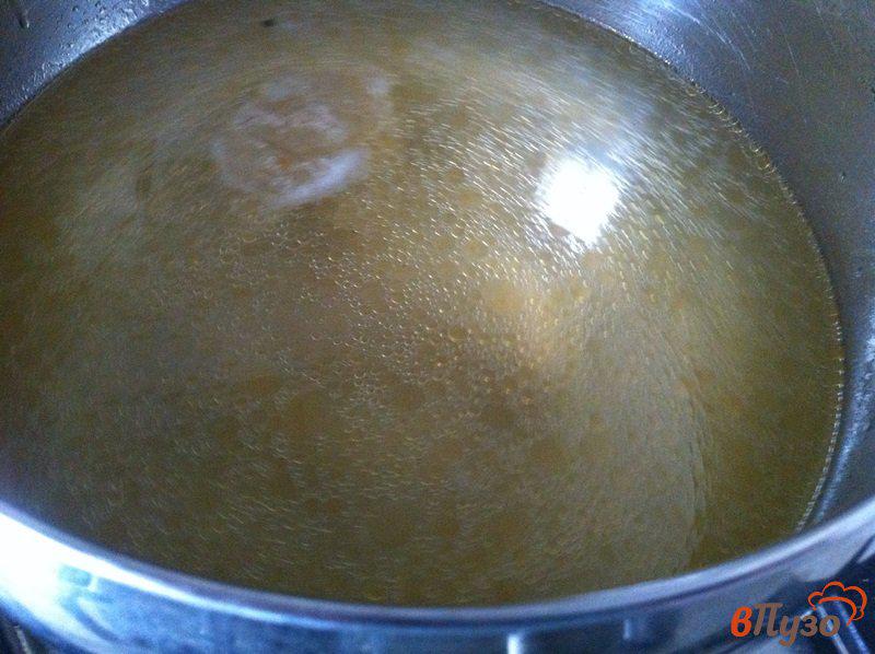 Фото приготовление рецепта: Рыбный суп с овощами и рисом шаг №1