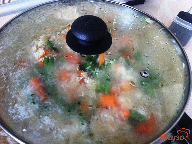Фото приготовление рецепта: Гарнир из риса и овощей шаг №6