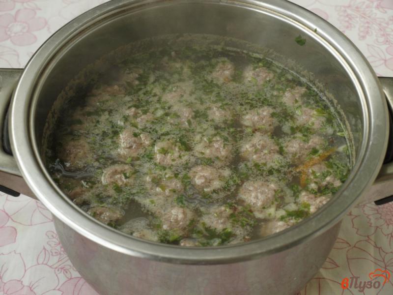 Фото приготовление рецепта: Гречневый суп с фрикадельками шаг №6