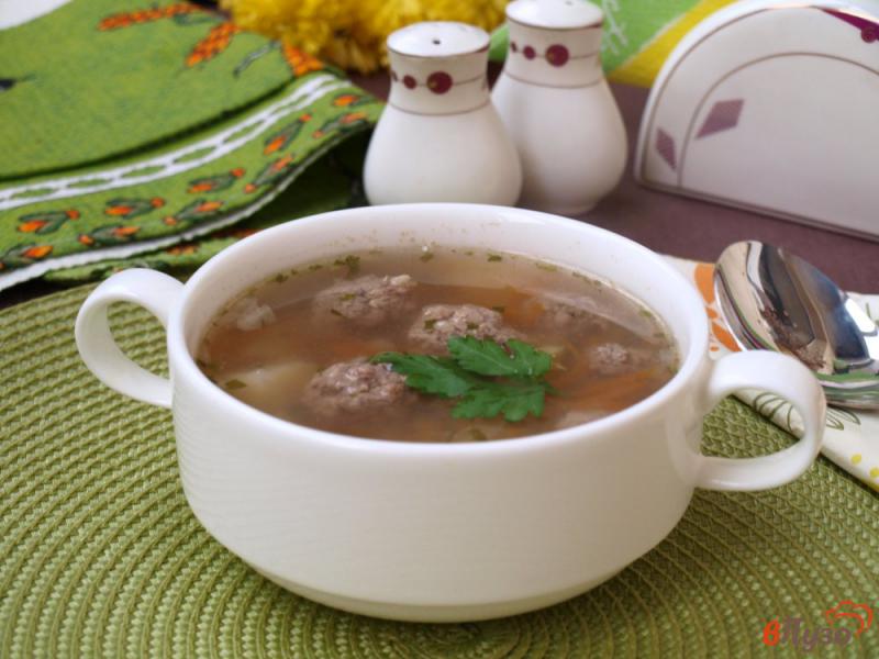 Фото приготовление рецепта: Гречневый суп с фрикадельками шаг №7