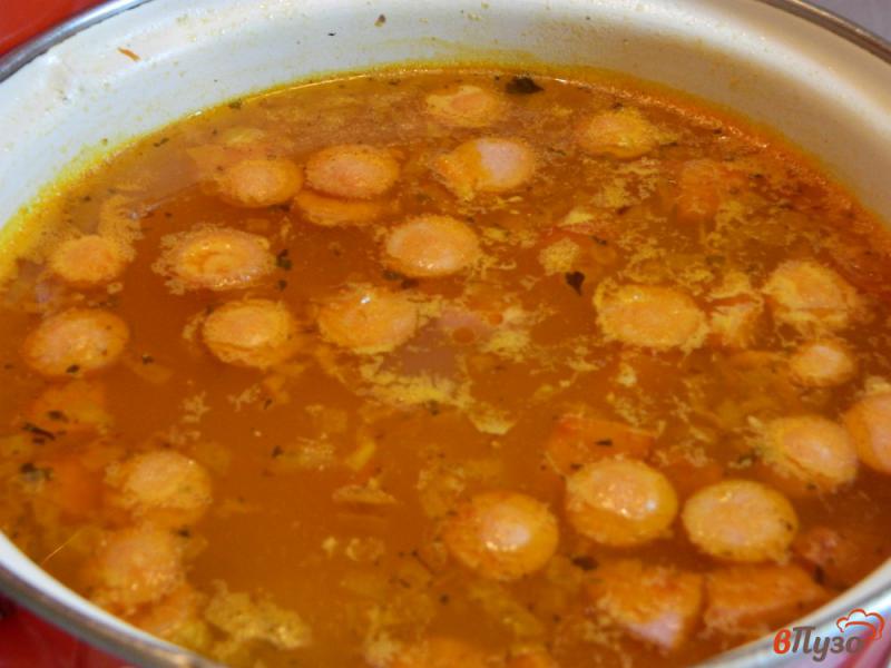 Фото приготовление рецепта: Картофельный суп с колбасой шаг №7