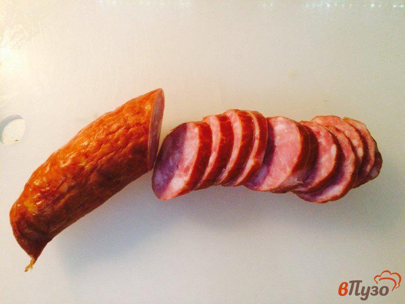 Фото приготовление рецепта: Запеченный картофель с полукопченой колбасой по-охотничьи шаг №6