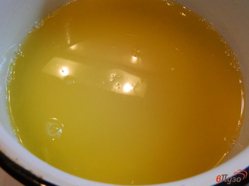 Фото приготовление рецепта: Тыквенные блинчики с апельсиново-лимонным соусом шаг №7