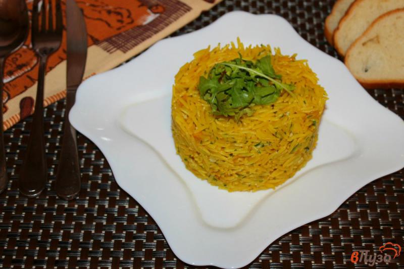 Фото приготовление рецепта: Рис с карри, чесноком и сливочным маслом шаг №6