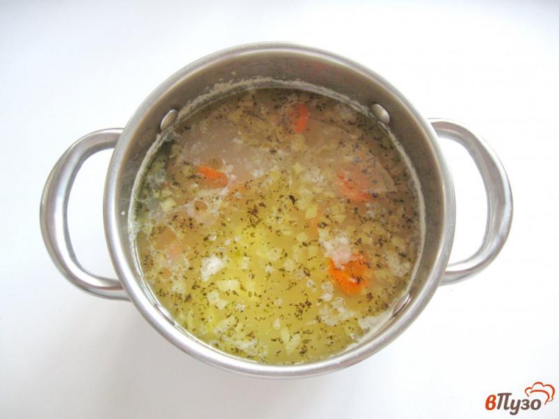 Фото приготовление рецепта: Рыбный суп с пшеном шаг №7