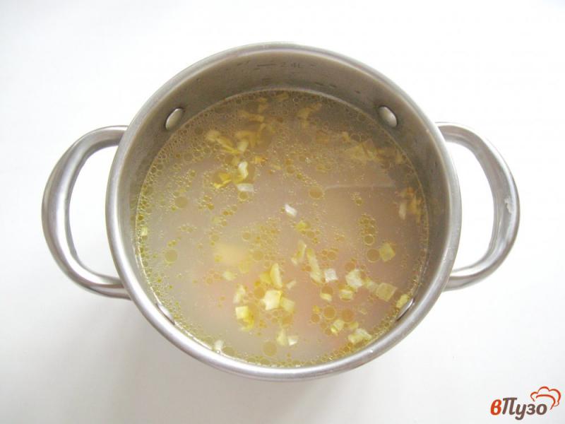 Фото приготовление рецепта: Рыбный суп с пшеном шаг №5