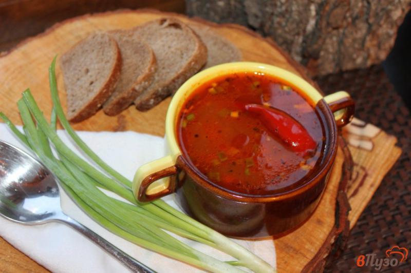 Фото приготовление рецепта: Острый томатный суп с копченостями шаг №8