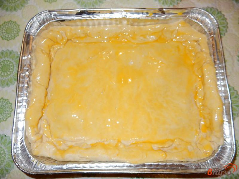 Фото приготовление рецепта: Луково-сырный пирог шаг №18