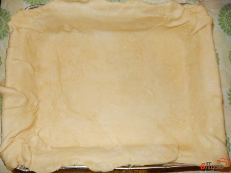 Фото приготовление рецепта: Луково-сырный пирог шаг №15