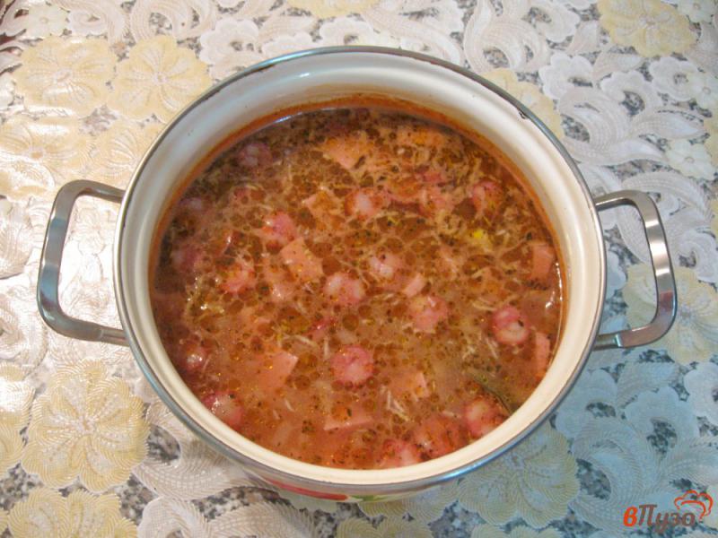 Фото приготовление рецепта: Суп с рисом и копченостями шаг №7