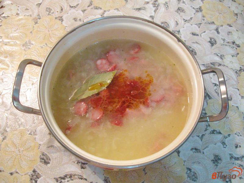 Фото приготовление рецепта: Суп с рисом и копченостями шаг №6