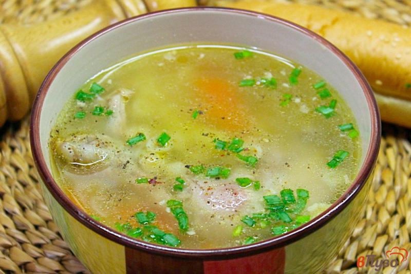 Фото приготовление рецепта: Куриный суп с макаронами шаг №6