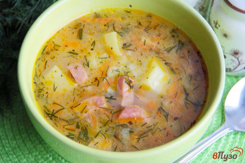 Фото приготовление рецепта: Суп с рисом и колбасой в мультиварке шаг №8