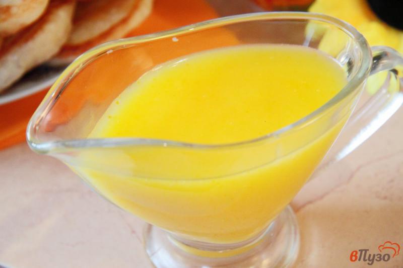 Фото приготовление рецепта: Апельсиновый соус к оладьям, блинчикам или сырникам шаг №5