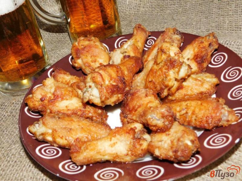 Фото приготовление рецепта: Куриные крылья в соево-горчичном соусе шаг №6