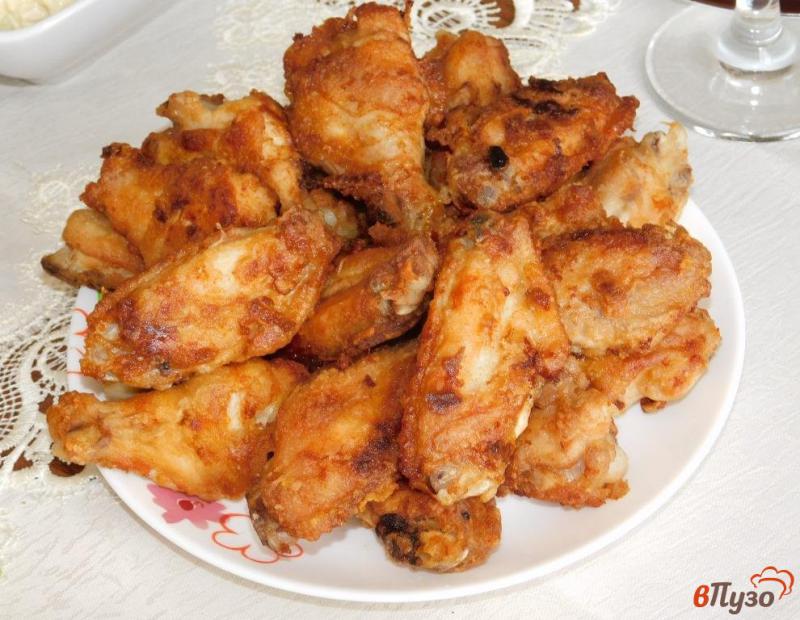 Фото приготовление рецепта: Куриные крылышки в пикантном маринаде шаг №6