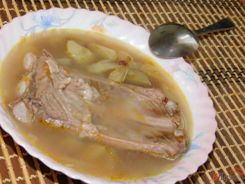 Фото приготовление рецепта: Суп на свиных ребрах с диким рисом шаг №4