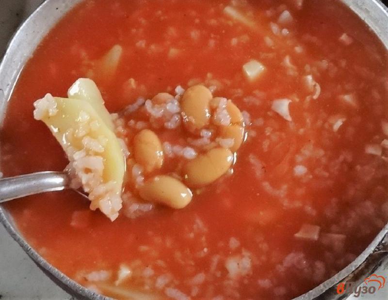 Фото приготовление рецепта: Фасолевый суп с рисом шаг №7