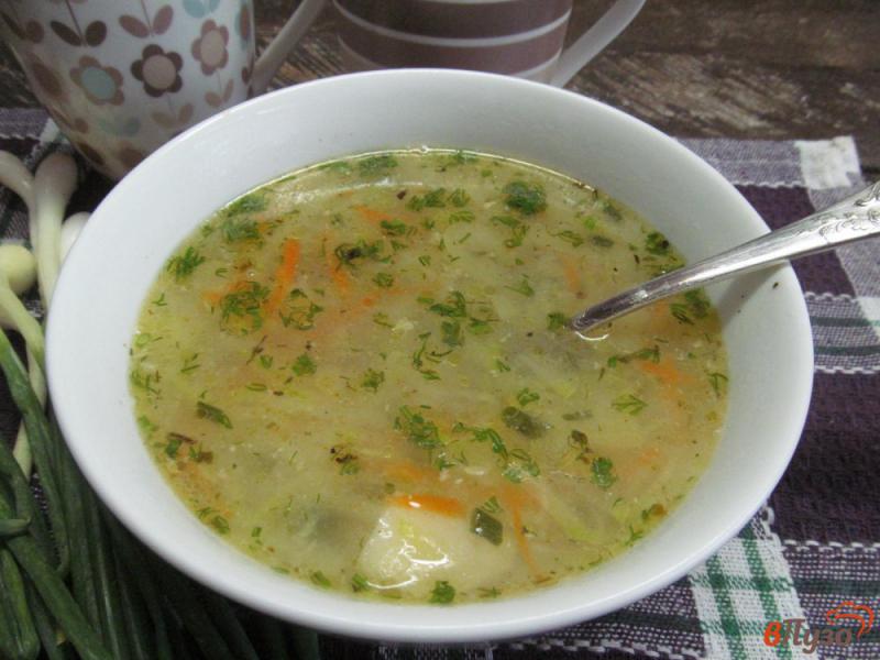 Фото приготовление рецепта: Суп с кабачком манной крупой и копченым сыром шаг №10
