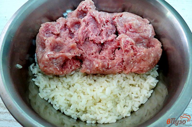 Фото приготовление рецепта: Кабачки фаршированные рисом и мясом шаг №5