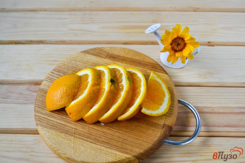 Фото приготовление рецепта: Компот из вишни с апельсином шаг №2