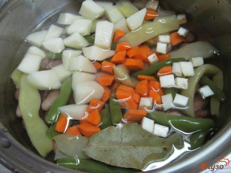 Фото приготовление рецепта: Острый фасолевый суп на беконе шаг №3