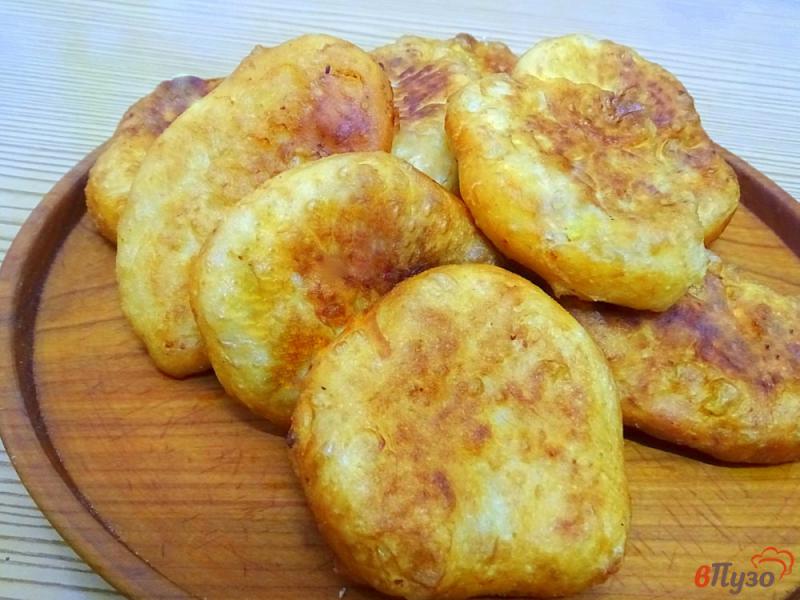 Фото приготовление рецепта: Пирожки дрожжевые с картошкой (жареные). шаг №13