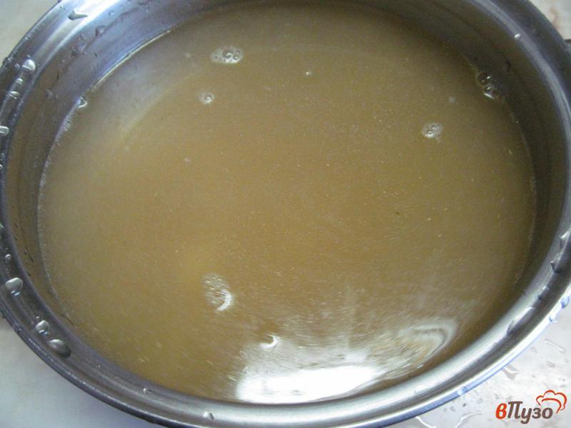 Фото приготовление рецепта: Суп из квашеной капустой и пшеном шаг №3