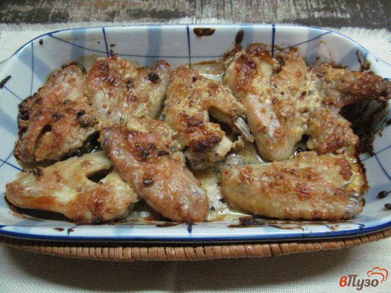 Фото приготовление рецепта: Запеченные маринованные куриные крылья шаг №4