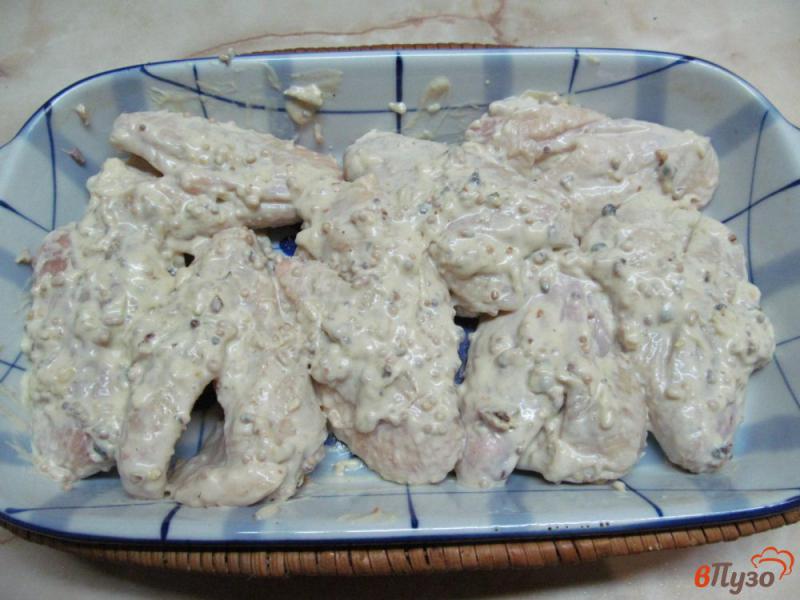 Фото приготовление рецепта: Запеченные маринованные куриные крылья шаг №3