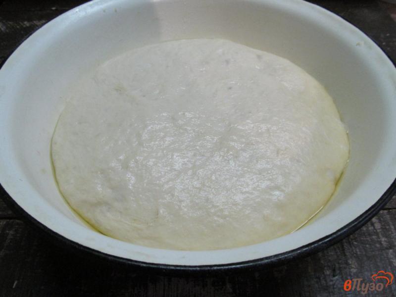 Фото приготовление рецепта: Духовые пирожки с капустой и грибами шаг №12