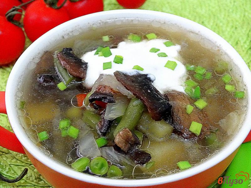 Фото приготовление рецепта: Суп из замороженных овощей и грибов шаг №7