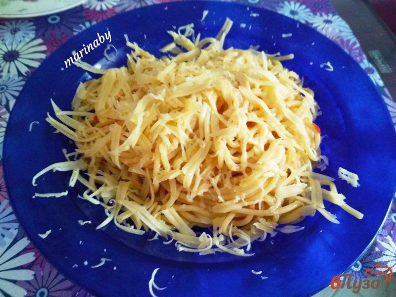 Фото приготовление рецепта: Спагетти с сыром шаг №7