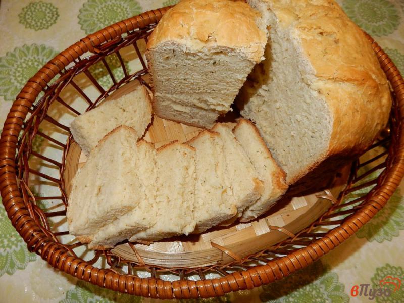 Фото приготовление рецепта: Французский хлеб с чесноком и зеленью шаг №13