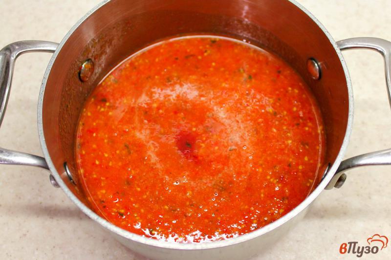 Фото приготовление рецепта: Тефтели в томатном соусе, приготовленные в духовке шаг №7