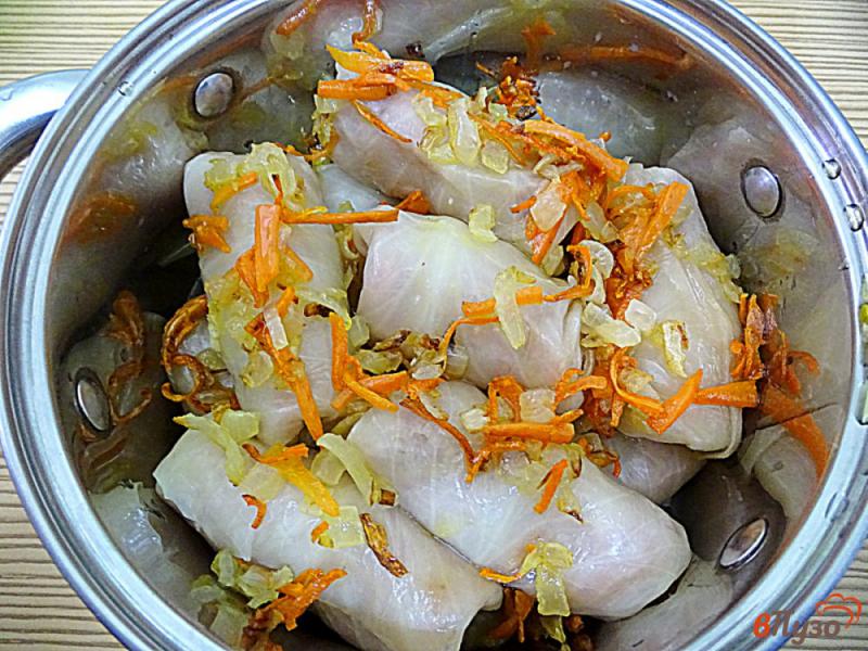 Фото приготовление рецепта: Голубцы со свининой из замороженной капустой шаг №11