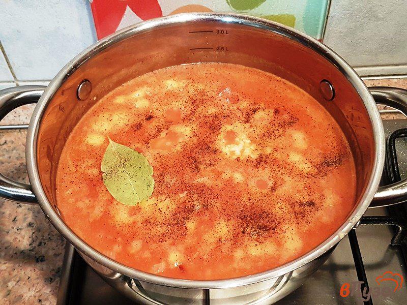 Фото приготовление рецепта: Томатный суп с рисом и овощами шаг №9