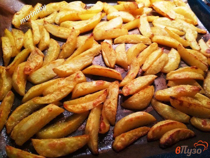 Фото приготовление рецепта: Запеченный картофель с куркумой шаг №6