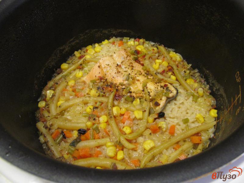 Фото приготовление рецепта: Рыба с рисом в мультиварке шаг №6