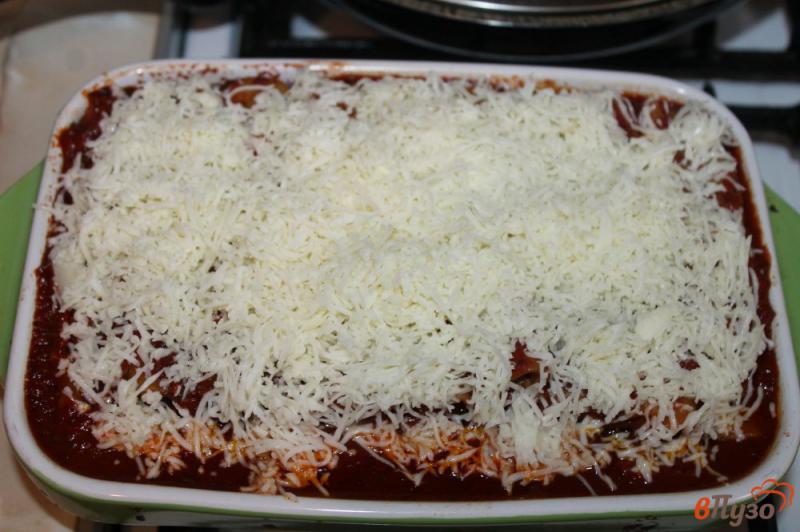 Фото приготовление рецепта: Каннеллони с фаршем под томатным соусом шаг №9