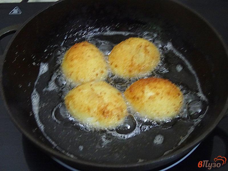 Фото приготовление рецепта: Закуска из обжареных яиц шаг №7