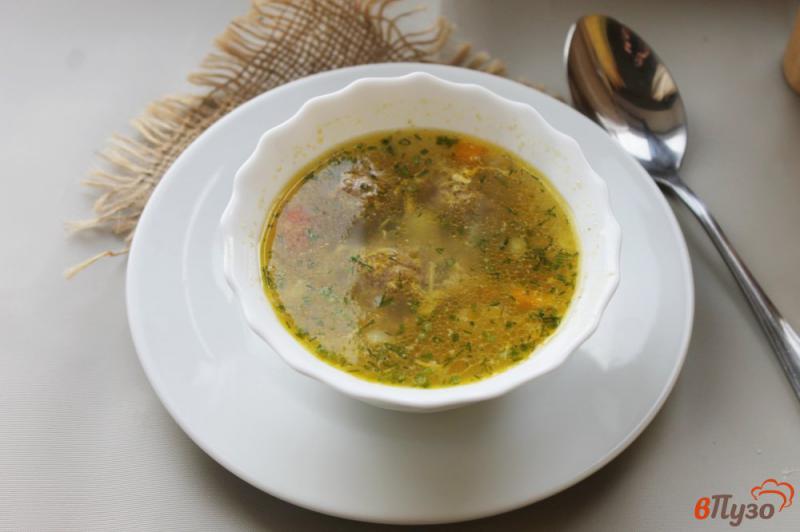 Фото приготовление рецепта: Суп с фрикадельками и яйцом шаг №8
