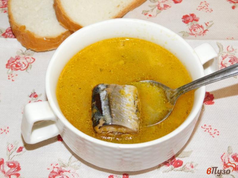 Фото приготовление рецепта: Суп из консервированной сайры с рисом шаг №6