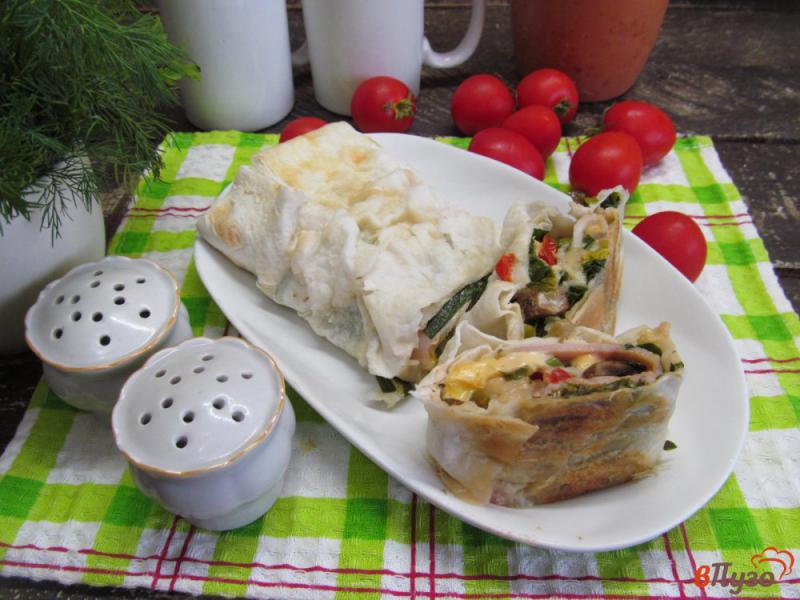 Фото приготовление рецепта: Пирог из лаваша с начинкой шаг №10
